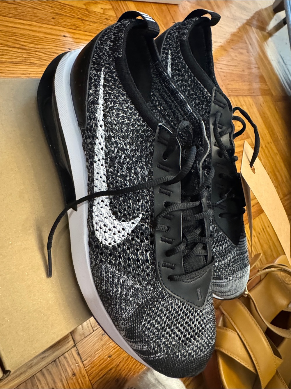 Nike Black and White Flyknit Trainers